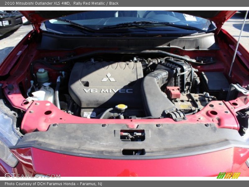 Rally Red Metallic / Black 2010 Mitsubishi Outlander XLS 4WD