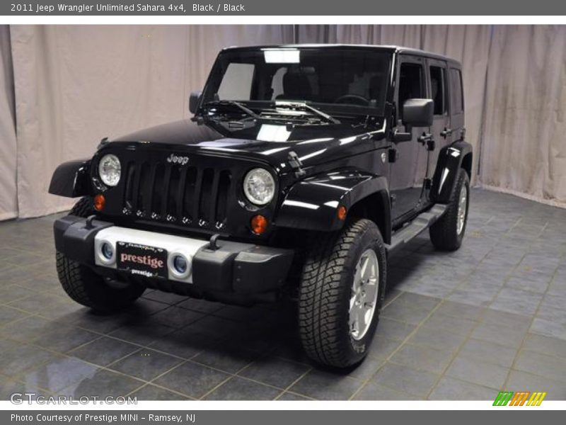 Black / Black 2011 Jeep Wrangler Unlimited Sahara 4x4