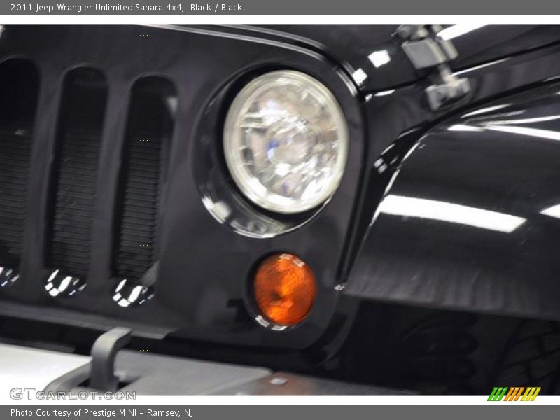Black / Black 2011 Jeep Wrangler Unlimited Sahara 4x4