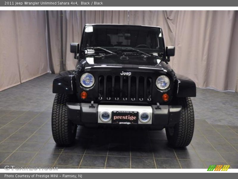 Black / Black 2011 Jeep Wrangler Unlimited Sahara 4x4