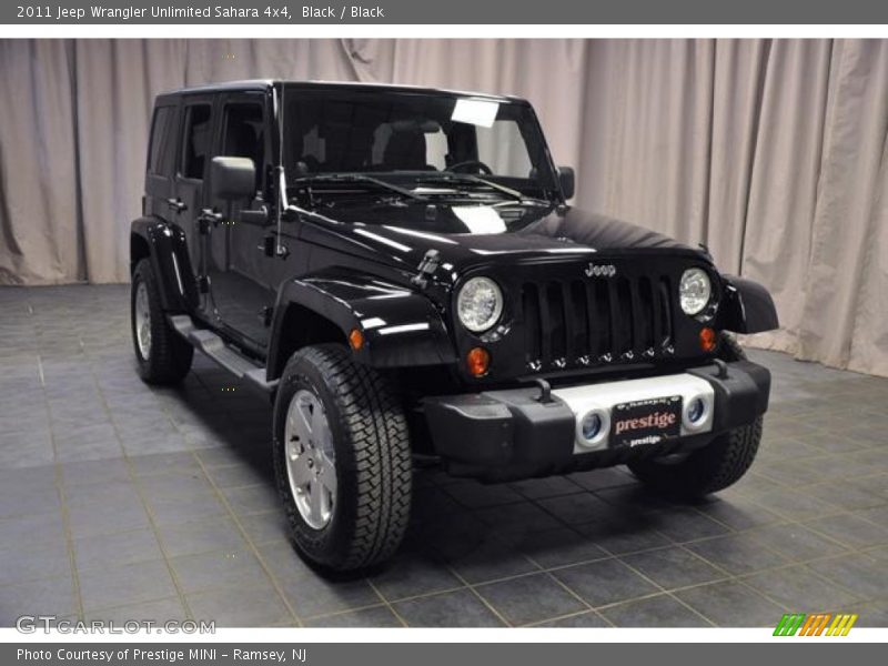 Black / Black 2011 Jeep Wrangler Unlimited Sahara 4x4