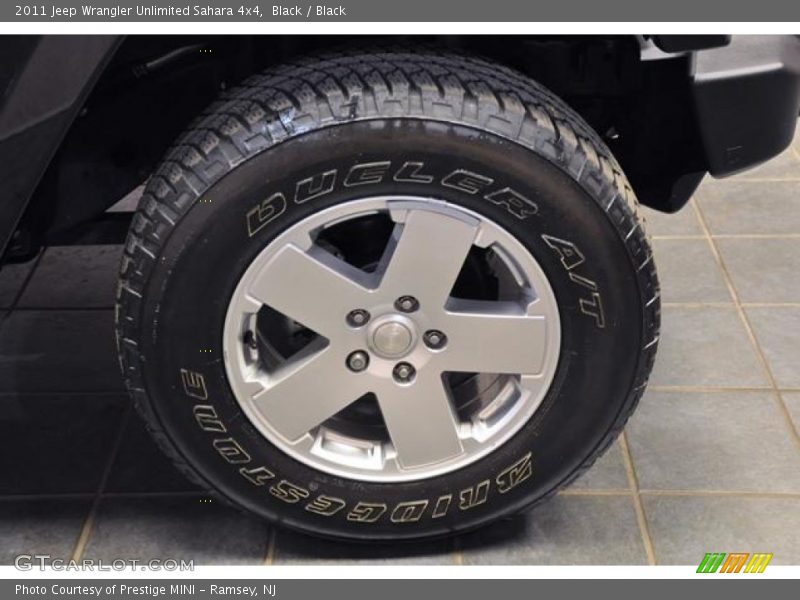 Black / Black 2011 Jeep Wrangler Unlimited Sahara 4x4