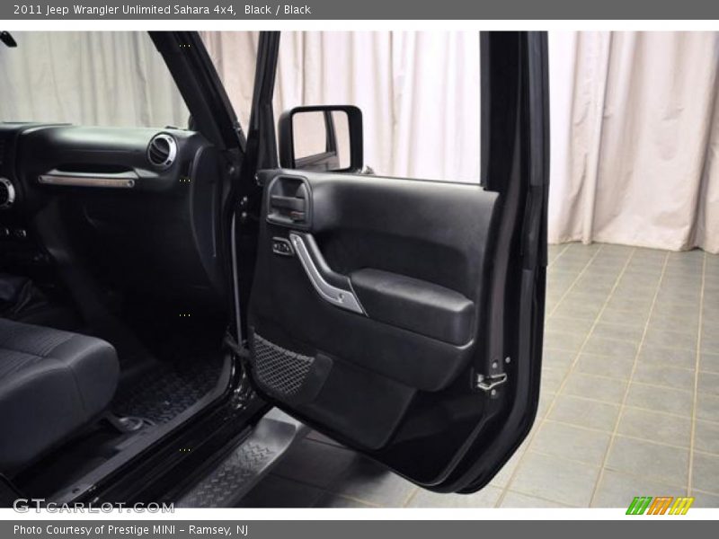 Black / Black 2011 Jeep Wrangler Unlimited Sahara 4x4