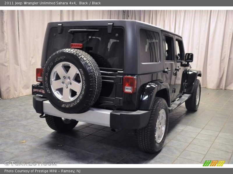 Black / Black 2011 Jeep Wrangler Unlimited Sahara 4x4
