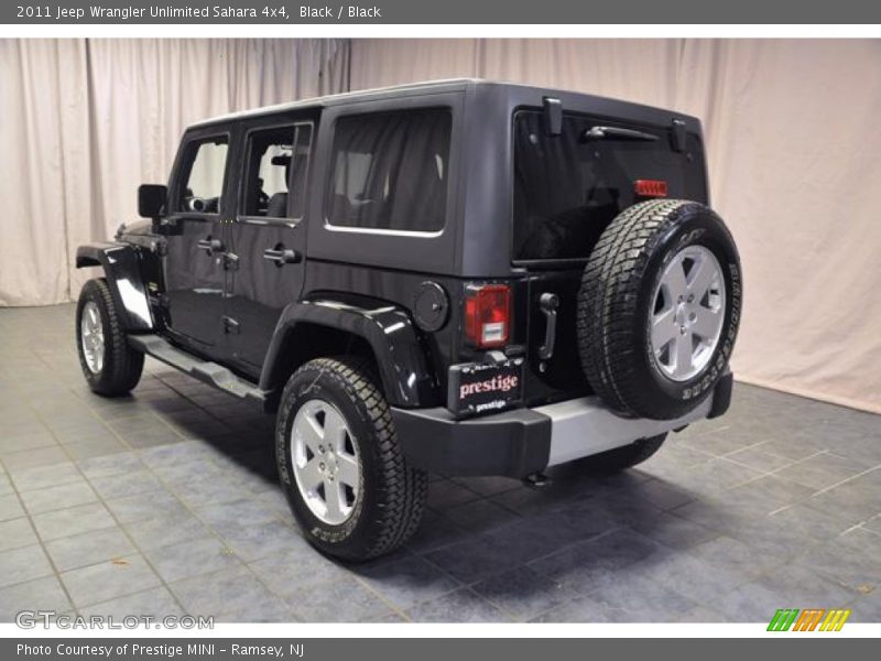 Black / Black 2011 Jeep Wrangler Unlimited Sahara 4x4