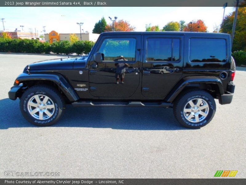 Black / Black 2013 Jeep Wrangler Unlimited Sahara 4x4