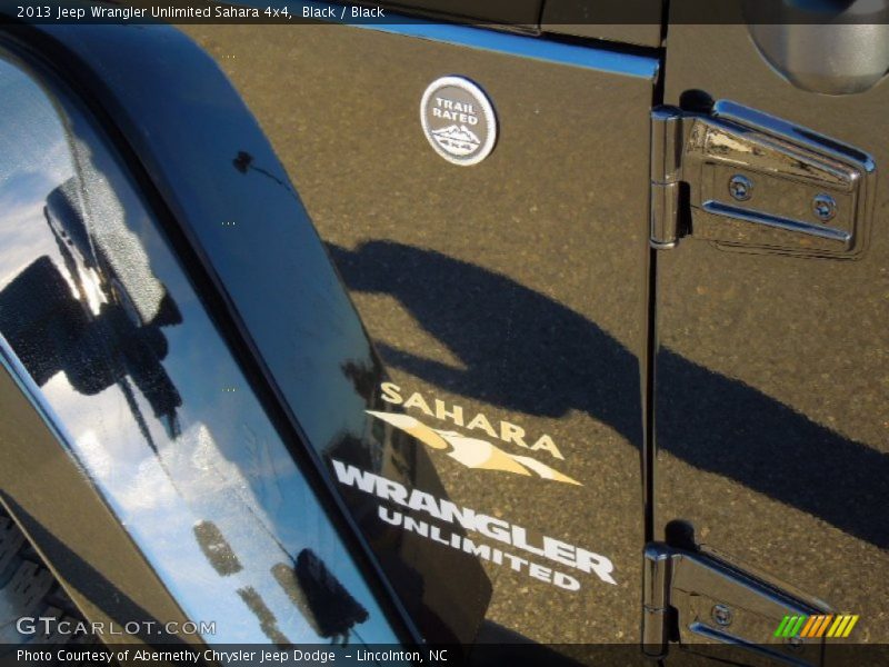 Black / Black 2013 Jeep Wrangler Unlimited Sahara 4x4