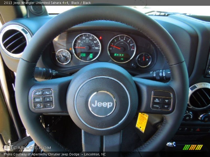 Black / Black 2013 Jeep Wrangler Unlimited Sahara 4x4