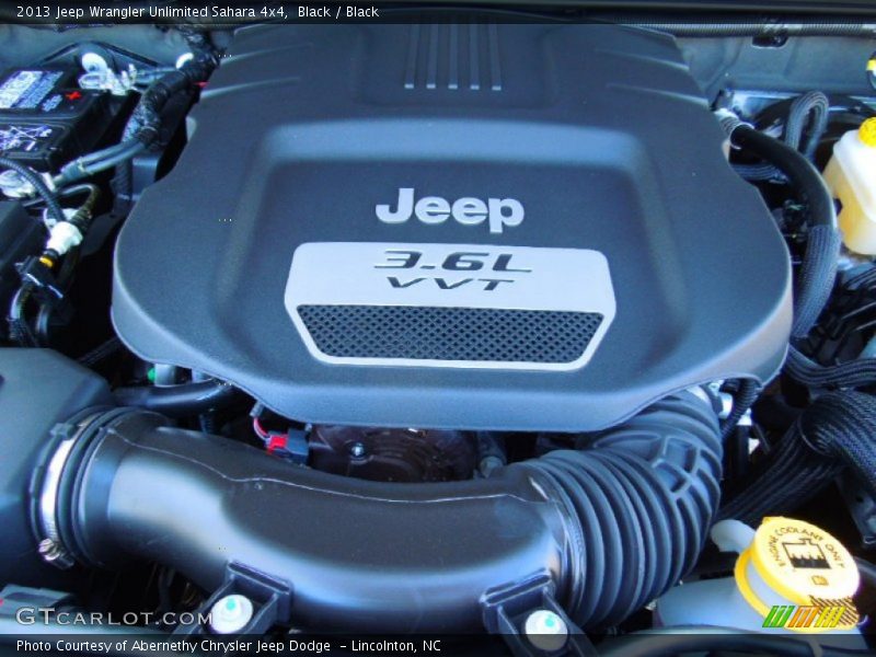 Black / Black 2013 Jeep Wrangler Unlimited Sahara 4x4