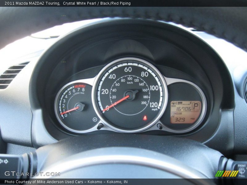 Crystal White Pearl / Black/Red Piping 2011 Mazda MAZDA2 Touring