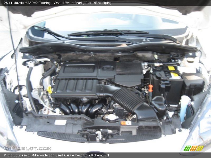 Crystal White Pearl / Black/Red Piping 2011 Mazda MAZDA2 Touring