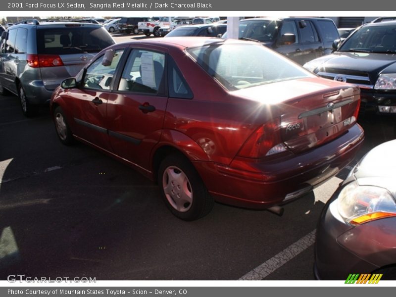 Sangria Red Metallic / Dark Charcoal Black 2001 Ford Focus LX Sedan