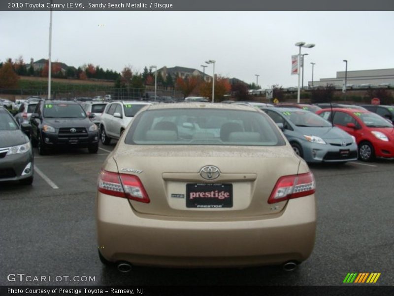 Sandy Beach Metallic / Bisque 2010 Toyota Camry LE V6