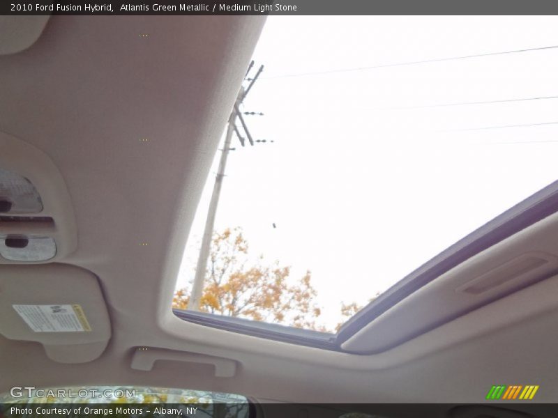 Atlantis Green Metallic / Medium Light Stone 2010 Ford Fusion Hybrid