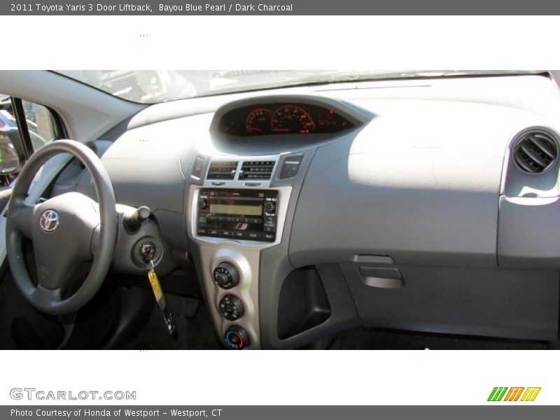 Bayou Blue Pearl / Dark Charcoal 2011 Toyota Yaris 3 Door Liftback