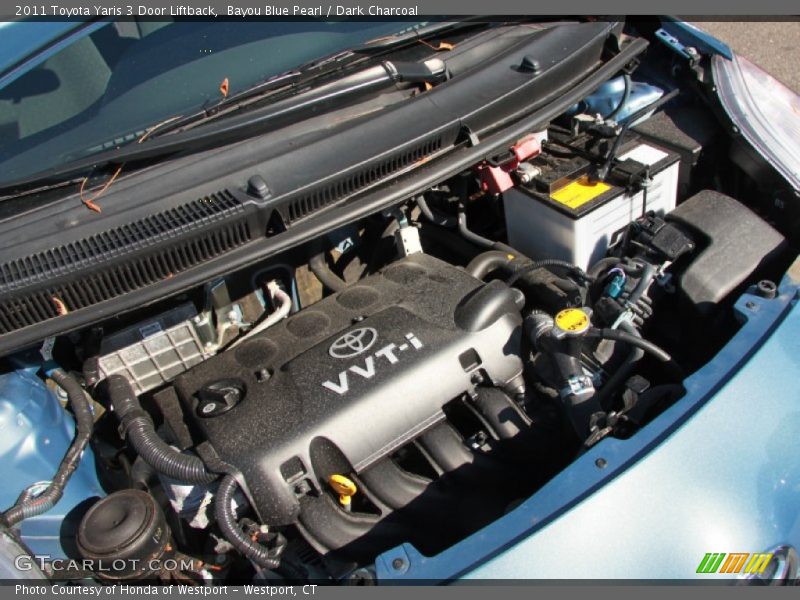 Bayou Blue Pearl / Dark Charcoal 2011 Toyota Yaris 3 Door Liftback