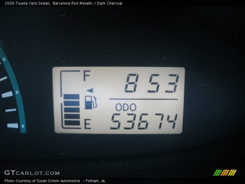 Barcelona Red Metallic / Dark Charcoal 2009 Toyota Yaris Sedan