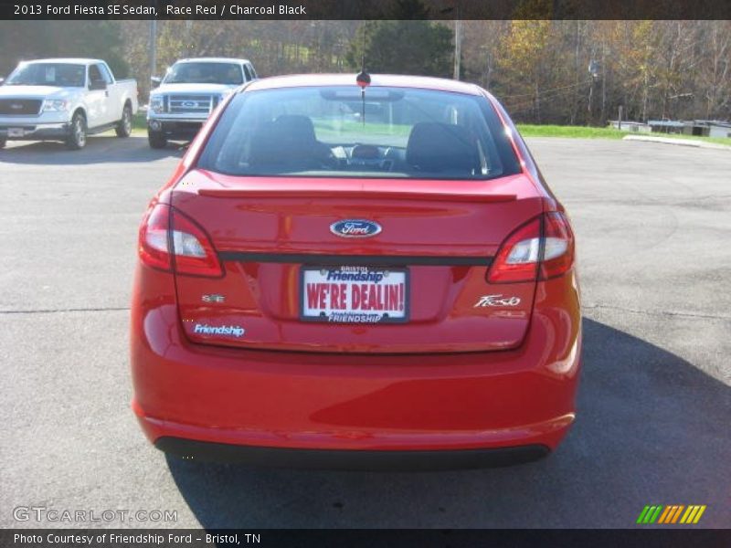 Race Red / Charcoal Black 2013 Ford Fiesta SE Sedan