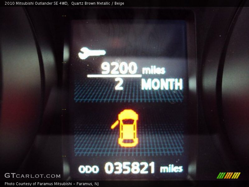 Quartz Brown Metallic / Beige 2010 Mitsubishi Outlander SE 4WD