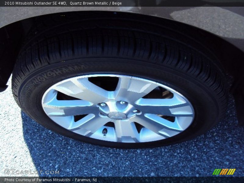 Quartz Brown Metallic / Beige 2010 Mitsubishi Outlander SE 4WD