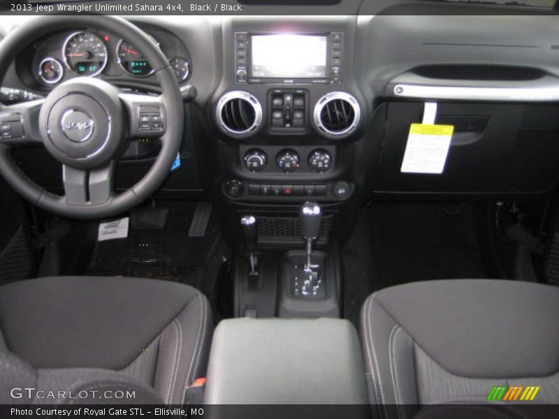 Black / Black 2013 Jeep Wrangler Unlimited Sahara 4x4