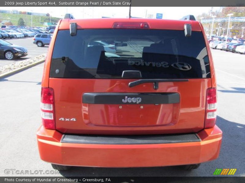 Sunburst Orange Pearl / Dark Slate Gray 2009 Jeep Liberty Sport 4x4