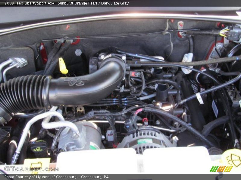 Sunburst Orange Pearl / Dark Slate Gray 2009 Jeep Liberty Sport 4x4