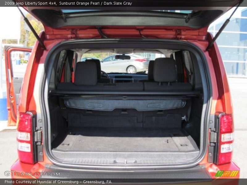 Sunburst Orange Pearl / Dark Slate Gray 2009 Jeep Liberty Sport 4x4