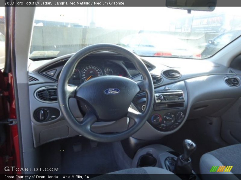 Sangria Red Metallic / Medium Graphite 2003 Ford Focus LX Sedan