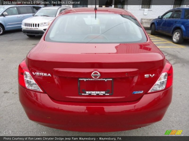 Red Brick / Charcoal 2012 Nissan Versa 1.6 SV Sedan