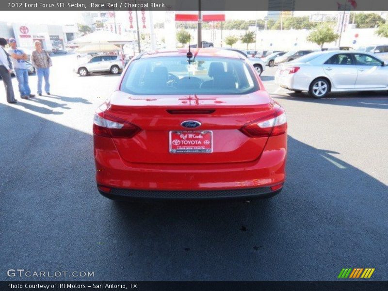 Race Red / Charcoal Black 2012 Ford Focus SEL Sedan