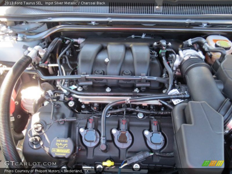 Ingot Silver Metallic / Charcoal Black 2013 Ford Taurus SEL