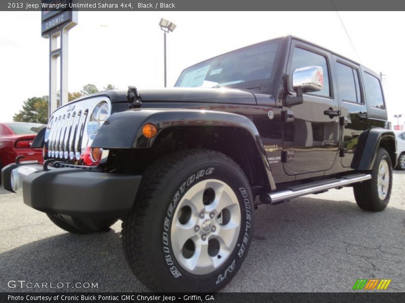 Black / Black 2013 Jeep Wrangler Unlimited Sahara 4x4