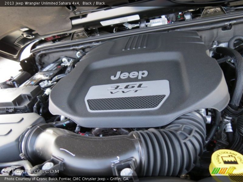 Black / Black 2013 Jeep Wrangler Unlimited Sahara 4x4