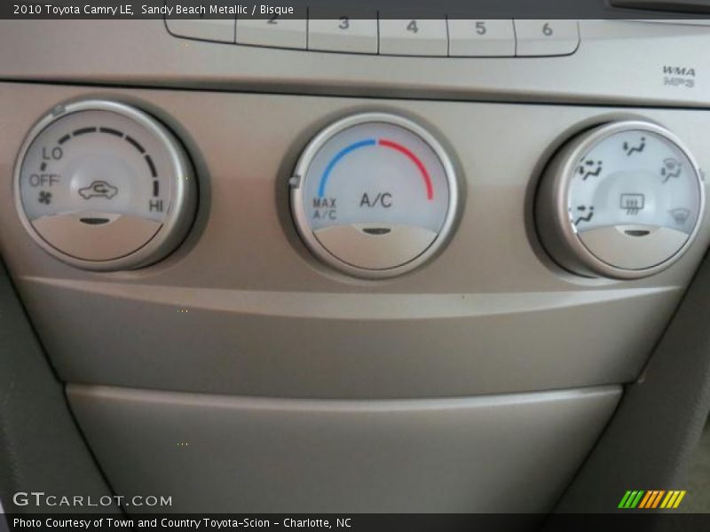 Sandy Beach Metallic / Bisque 2010 Toyota Camry LE