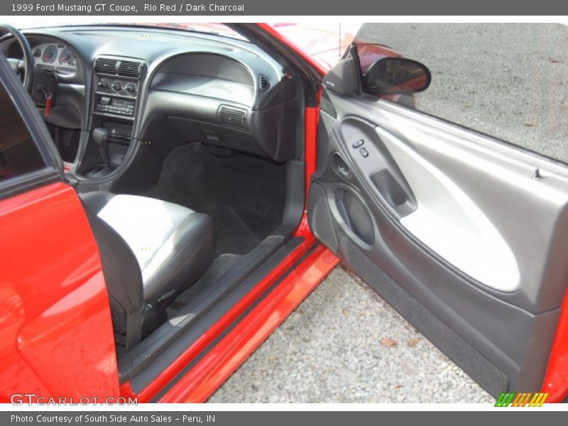 Rio Red / Dark Charcoal 1999 Ford Mustang GT Coupe