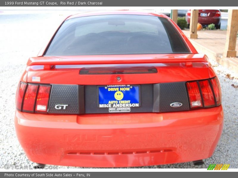 Rio Red / Dark Charcoal 1999 Ford Mustang GT Coupe