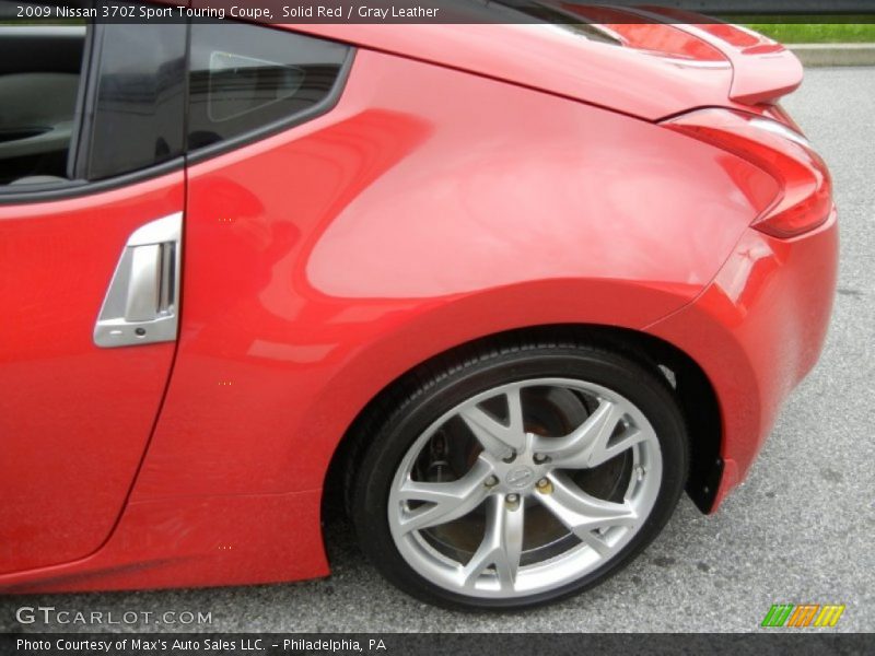 Solid Red / Gray Leather 2009 Nissan 370Z Sport Touring Coupe