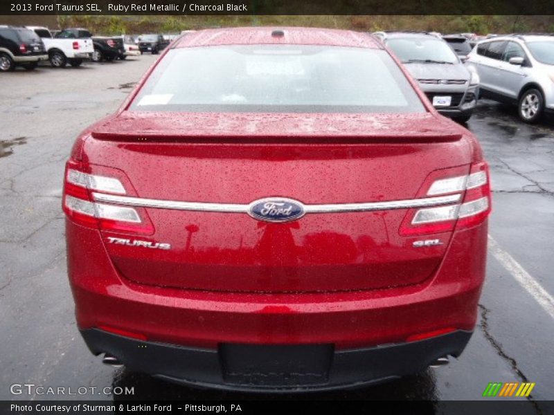 Ruby Red Metallic / Charcoal Black 2013 Ford Taurus SEL