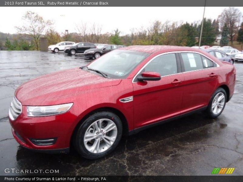 Ruby Red Metallic / Charcoal Black 2013 Ford Taurus SEL