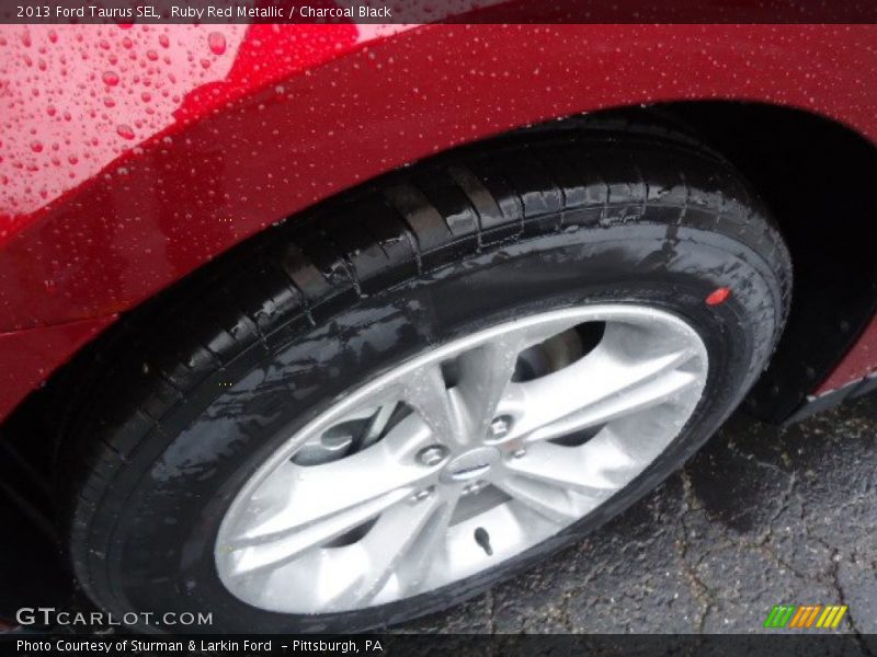 Ruby Red Metallic / Charcoal Black 2013 Ford Taurus SEL