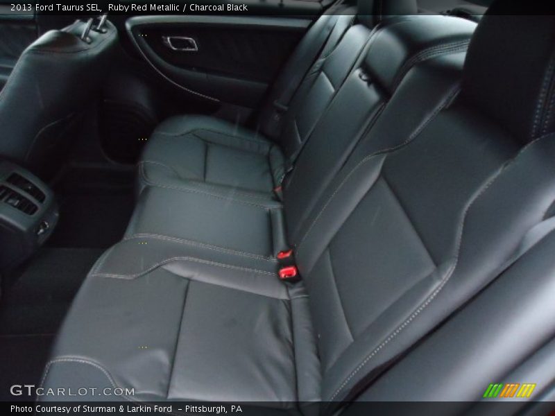 Ruby Red Metallic / Charcoal Black 2013 Ford Taurus SEL