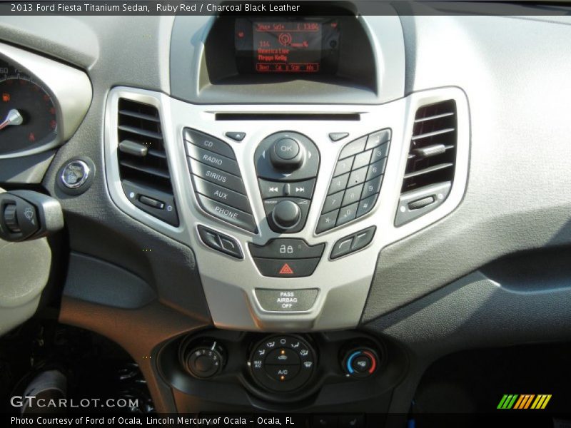 Ruby Red / Charcoal Black Leather 2013 Ford Fiesta Titanium Sedan