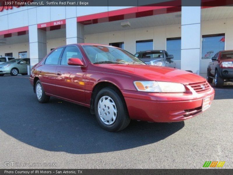 Sunfire Red Pearl / Beige 1997 Toyota Camry LE