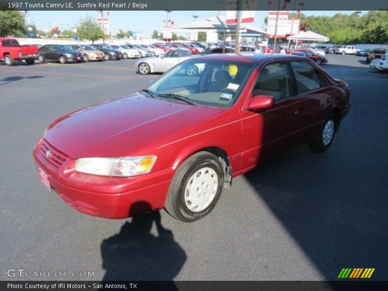 Sunfire Red Pearl / Beige 1997 Toyota Camry LE