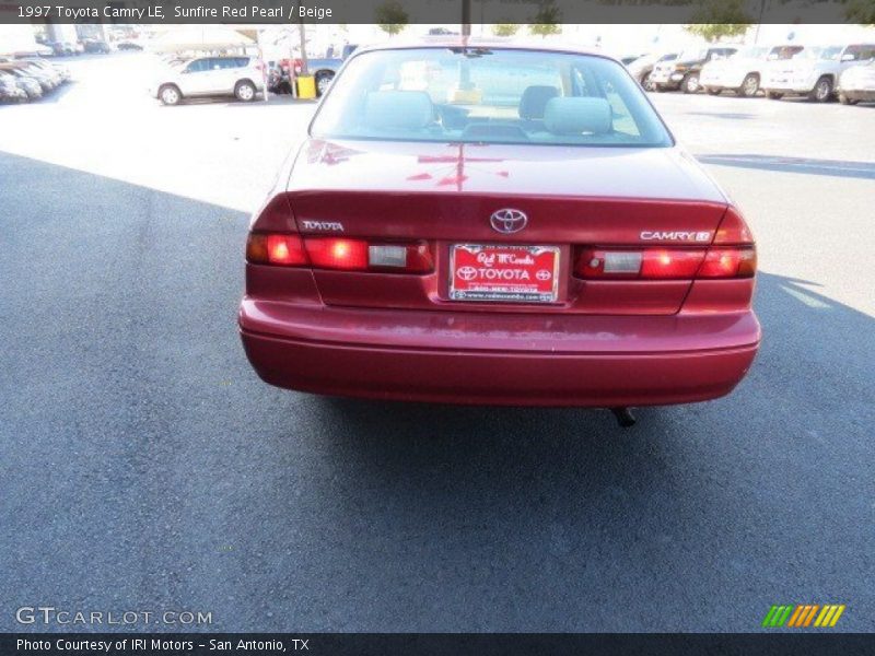 Sunfire Red Pearl / Beige 1997 Toyota Camry LE