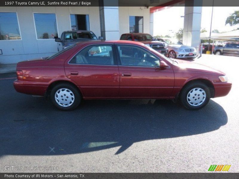 Sunfire Red Pearl / Beige 1997 Toyota Camry LE