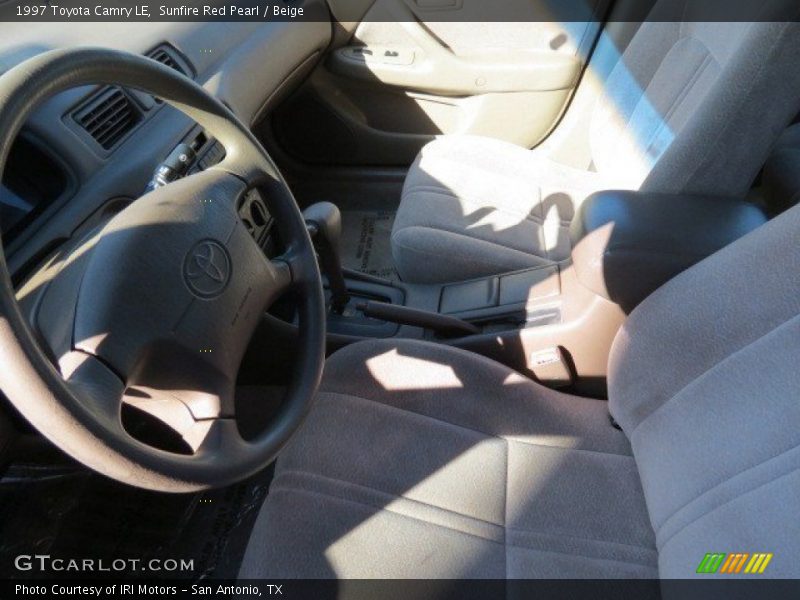Sunfire Red Pearl / Beige 1997 Toyota Camry LE