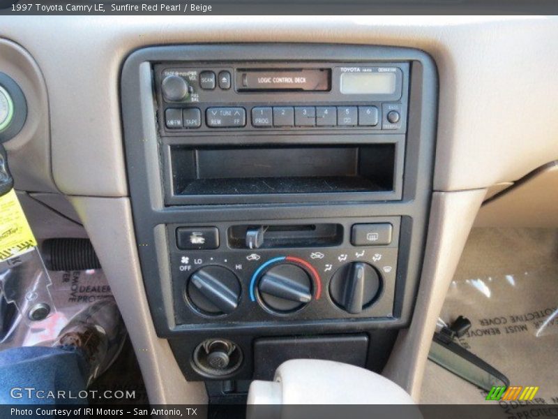 Sunfire Red Pearl / Beige 1997 Toyota Camry LE