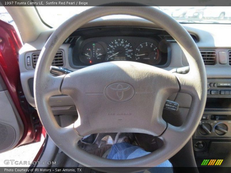 Sunfire Red Pearl / Beige 1997 Toyota Camry LE